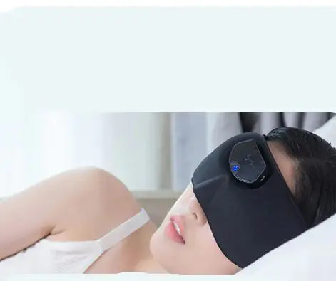 Woman wearing a Smart Sleep Mask for relaxation and better sleep quality.